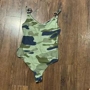 A camo one piece. Thong on the back.